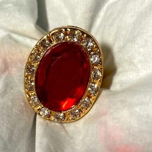 Ruby stone with sapphire ring. Gold backing #031